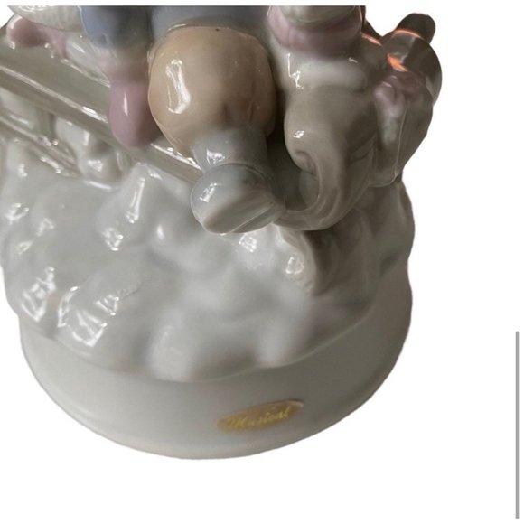 Let It Snow” Summit Collection Musical Rotating Ceramic Christmas Sledding - Picture 4 of 5